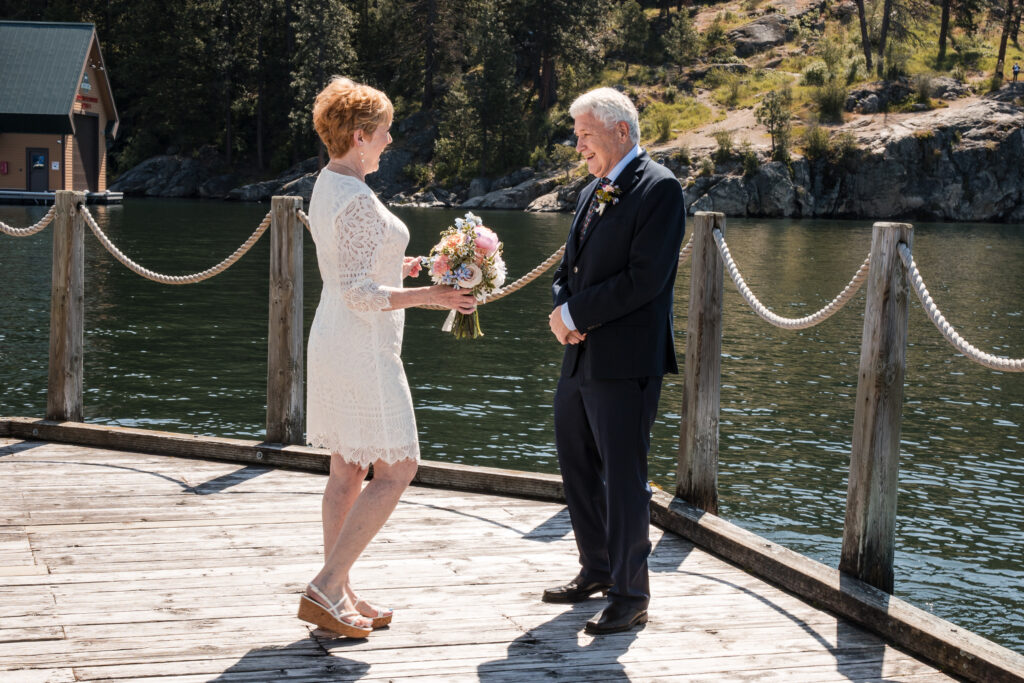 Groom smiling as he sees the bride for the first time during their elopement
