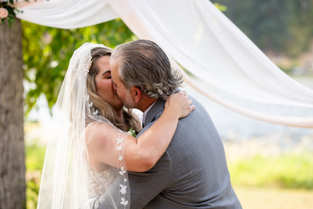 Bride and goom kissing